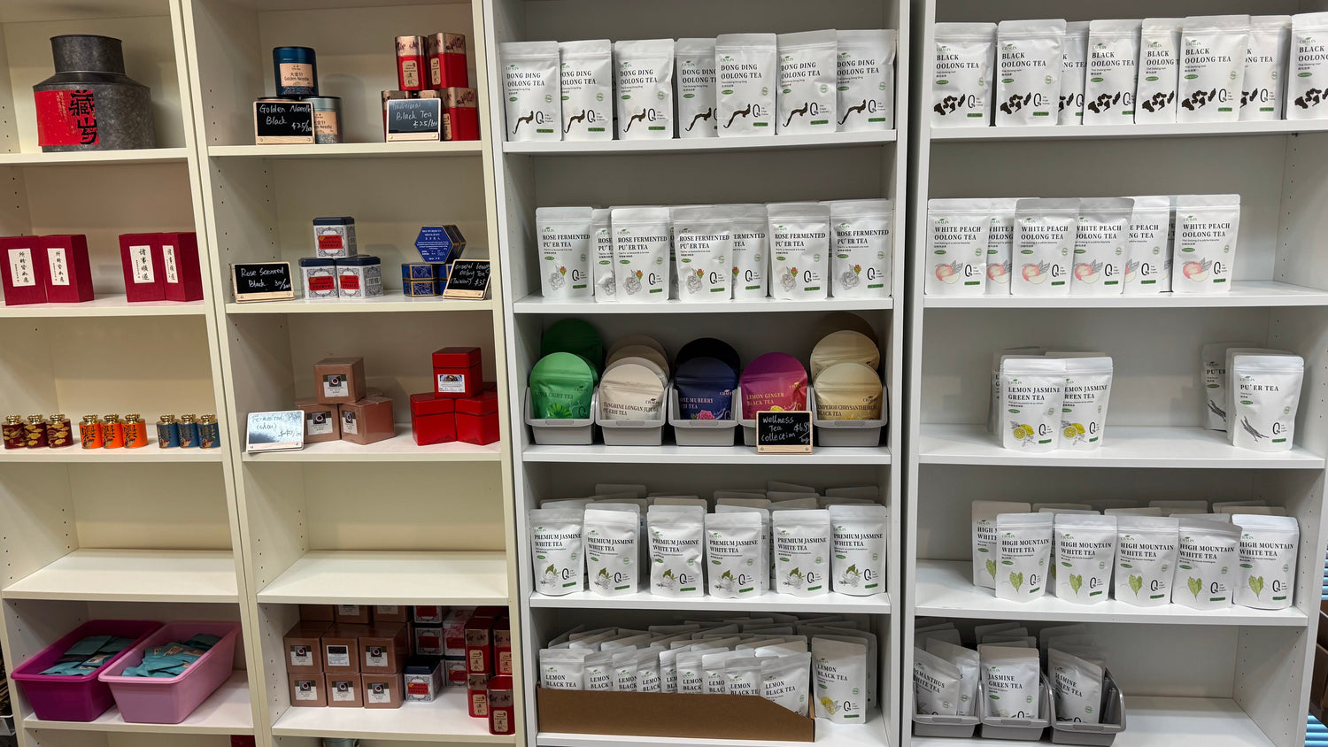 Shelves stocked with various products in a store setting