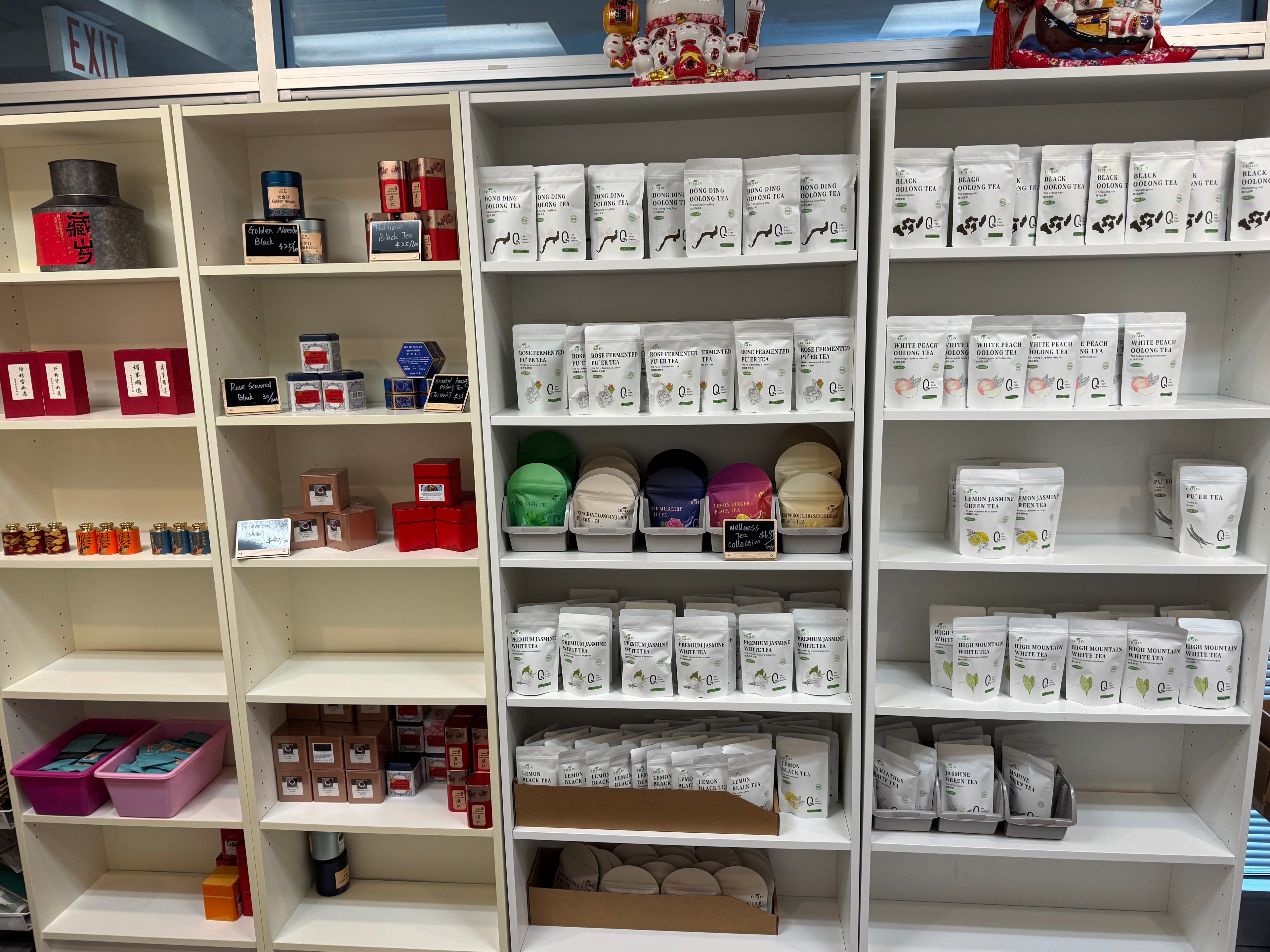 Shelves stocked with various products in a store setting