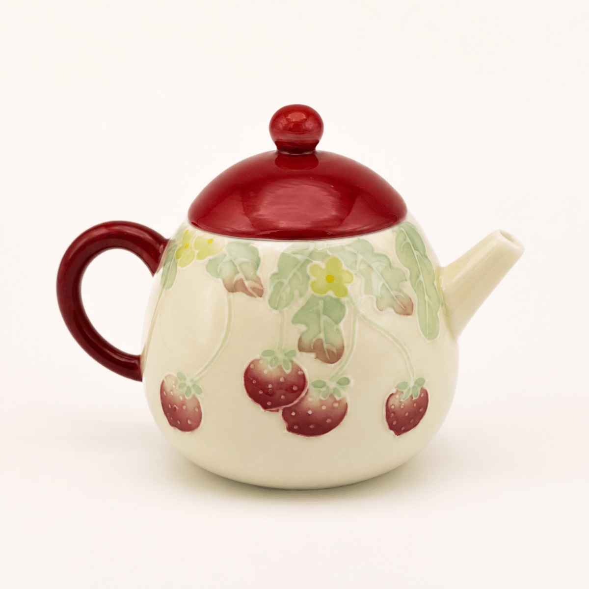 Cream ceramic teapot with red lid and floral design, 200ml